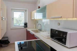 Kuchyňa alebo kuchynka v ubytovaní Apartments Salatić