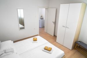 Postel nebo postele na pokoji v ubytování TayLa-Apartment Vodice
