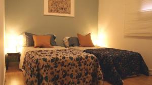 A bed or beds in a room at Casa Azahar