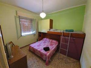 A bed or beds in a room at Villa Capriccio