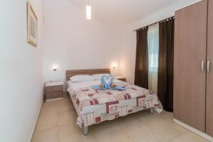 Posteľ alebo postele v izbe v ubytovaní Apartments Salatić + 37 fotografií