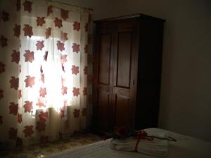 Posteľ alebo postele v izbe v ubytovaní casetta del nonno bis