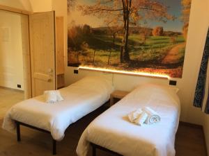 Postel nebo postele na pokoji v ubytování B&B da Erica
