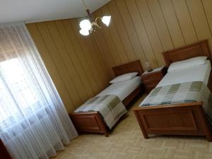 Ένα ή περισσότερα κρεβάτια σε δωμάτιο στο Appartamenti Paolo
