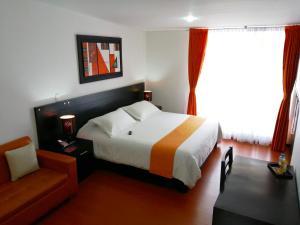 Ένα ή περισσότερα κρεβάτια σε δωμάτιο στο Hotel Palermo Suite