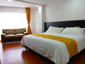Ένα ή περισσότερα κρεβάτια σε δωμάτιο στο Hotel Palermo Suite