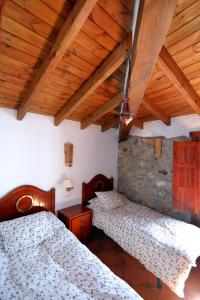 Posteľ alebo postele v izbe v ubytovaní Casa Rural en Grazalema
