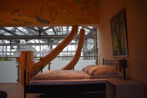 Postel nebo postele na pokoji v ubytování Palmengarten