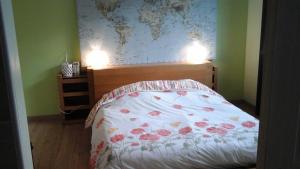 Ένα ή περισσότερα κρεβάτια σε δωμάτιο στο L atelier