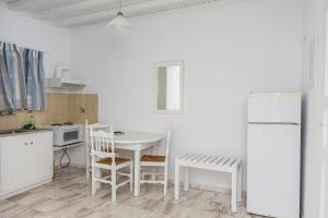 Kuchyň nebo kuchyňský kout v ubytování Mykonos Vouniotis Rooms