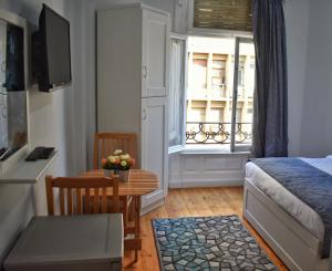 Postel nebo postele na pokoji v ubytování columbia downtown cairo