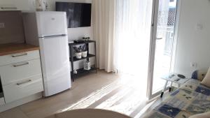 Fotografie z fotogalerie ubytování Apartments Rosi v Primoštenu