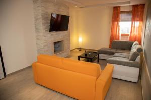 TV a/nebo společenská místnost v ubytování B&B Miramare Suite
