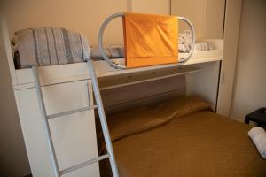 Postel nebo postele na pokoji v ubytování B&B Miramare Suite