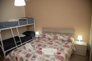 Postel nebo postele na pokoji v ubytování B&B Miramare Suite