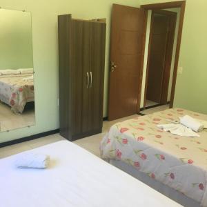 Katil atau katil-katil dalam bilik di Suites e Flats Trancoso