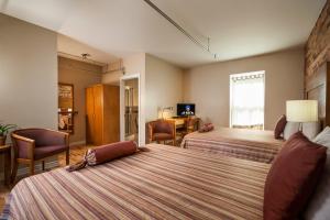 TV a/nebo společenská místnost v ubytování Hotel Quartier des Spectacles