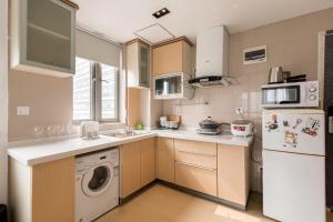 Una cocina o zona de cocina en Sidihome Selected City Apartment
