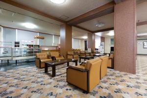 Posezení v ubytování Tsuruga Tunnel Onsen Kitaguni Grand Hotel