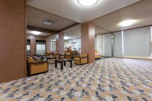 Posezení v ubytování Tsuruga Tunnel Onsen Kitaguni Grand Hotel
