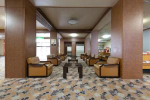 Posezení v ubytování Tsuruga Tunnel Onsen Kitaguni Grand Hotel