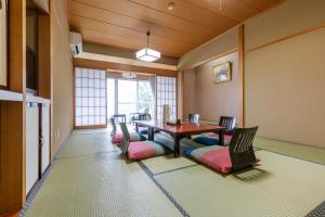 Posezení v ubytování Tsuruga Tunnel Onsen Kitaguni Grand Hotel