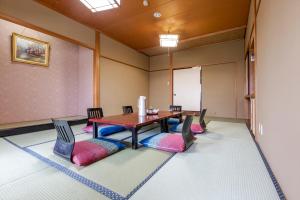 Posezení v ubytování Tsuruga Tunnel Onsen Kitaguni Grand Hotel