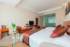 Cama o camas de una habitación en Xi Tang Hotel