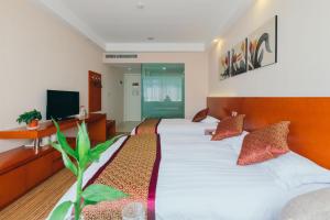 Cama o camas de una habitación en Xi Tang Hotel