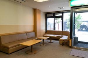 Posezení v ubytování Tabist Kanko Business Hotel Matsuyama Hida Takayama