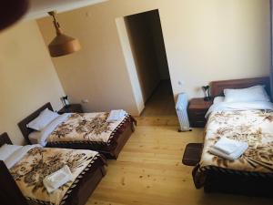 Postel nebo postele na pokoji v ubytování Guesthouse AlpenRose