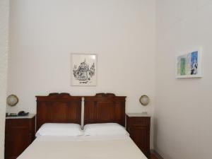 Postel nebo postele na pokoji v ubytování Hotel Annalena