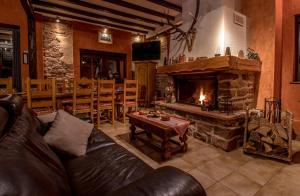 Posezení v ubytování Chambres d'Hôtes Au Freidbarry