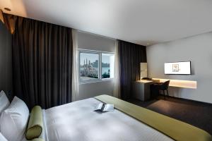 72 Hotel Sharjah客房内的一张或多张床位