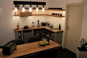 A kitchen or kitchenette at A Lux Villas Santorini