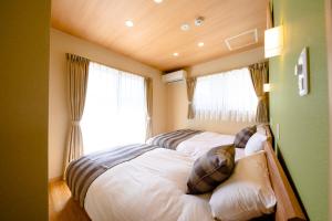 Katil atau katil-katil dalam bilik di 23 ORIYA Mt Fuji -雅MIYABI-