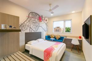 Rúm í herbergi á Ginger Bhubaneshwar