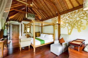 Postelja oz. postelje v sobi nastanitve DISINI Luxury Spa Villas-CHSE Certified