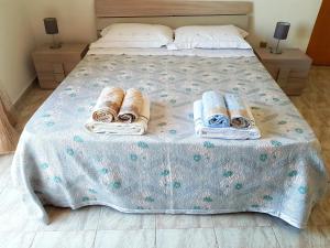 Posteľ alebo postele v izbe v ubytovaní La Cittadella apartement