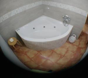 Kúpeľňa v ubytovaní Escapadas romanticas en Granada jacuzzi