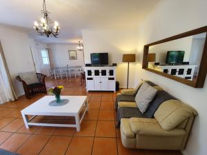 Khu vực ghế ngồi tại Paradiso Guesthouse & Self-catering Cottage
