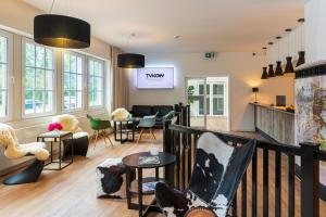 TV a/nebo společenská místnost v ubytování Lake House Plön