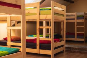 a group of bunk beds in a room at Refugio de Bujaruelo in Torla-Ordesa