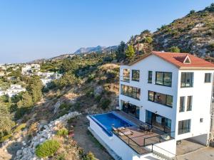 an aerial view of a house with a swimming pool at Spectacular Villa In Kyrenia in Kyrenia