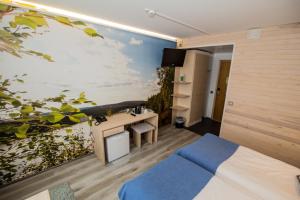 Postel nebo postele na pokoji v ubytování Hotel Ivalo