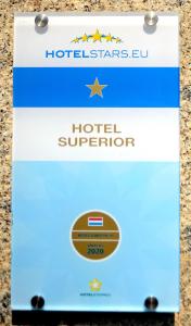 a box with a hotel superhero sign on it at Hotel Abba in Amsterdam