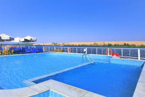 a large swimming pool on a cruise ship at Jaz Crown Jubilee Nile Cruise - Every Thursday from Luxor for 07 & 04 Nights - Every MondayFrom Aswan for 03 Nights in Luxor