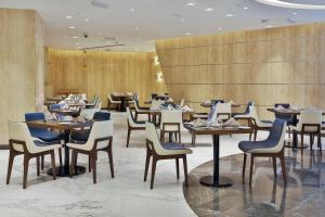 Un restaurant sau alt loc unde se poate mânca la VIP Hotel Doha Qatar