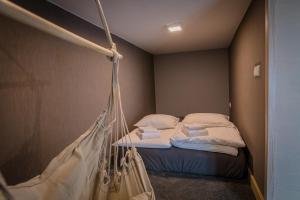 Postel nebo postele na pokoji v ubytování Apartamenty Vilda