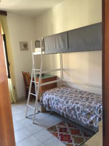 Posteľ alebo postele v izbe v ubytovaní CASAVACANZA CHIARA